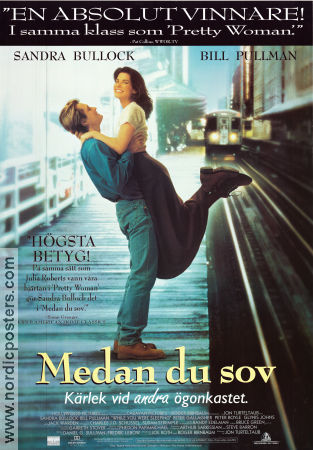 Medan du sov 1993 poster Sandra Bullock Bill Pullman Jon Turteltaub Romantik Tåg