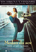 Medan du sov 1993 poster Sandra Bullock Bill Pullman Jon Turteltaub Romantik Tåg